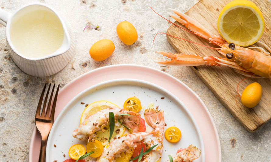 Pavillon France. Recette de langoustines rôties à l'huile d'olive et aux agrumes